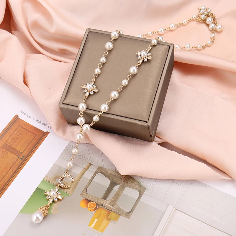 

Korean Fashion Pearl Long Double Layer Pendant Necklace Sweater Chain Accessories