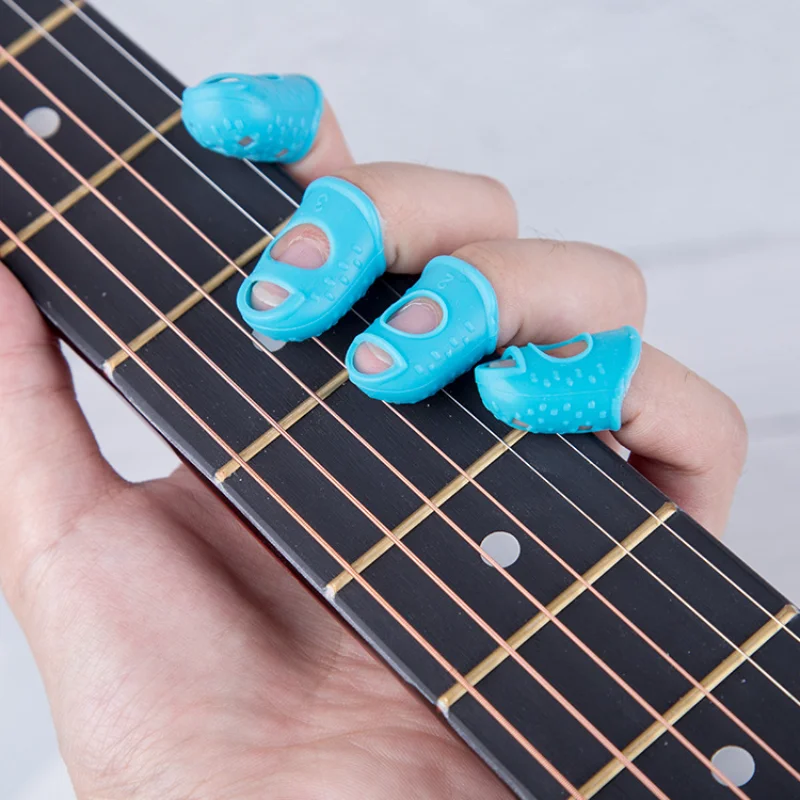 

4Pcs Silicone Finger Guards Guitar Fingertip Protectors For Ukulele Guitar Non-Slip Finger Sets 6 Color Optional