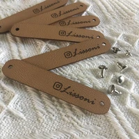 30pcs knitting labels customize logo text leather crochet tags with rivets personalized handmade clothing hats label center fold