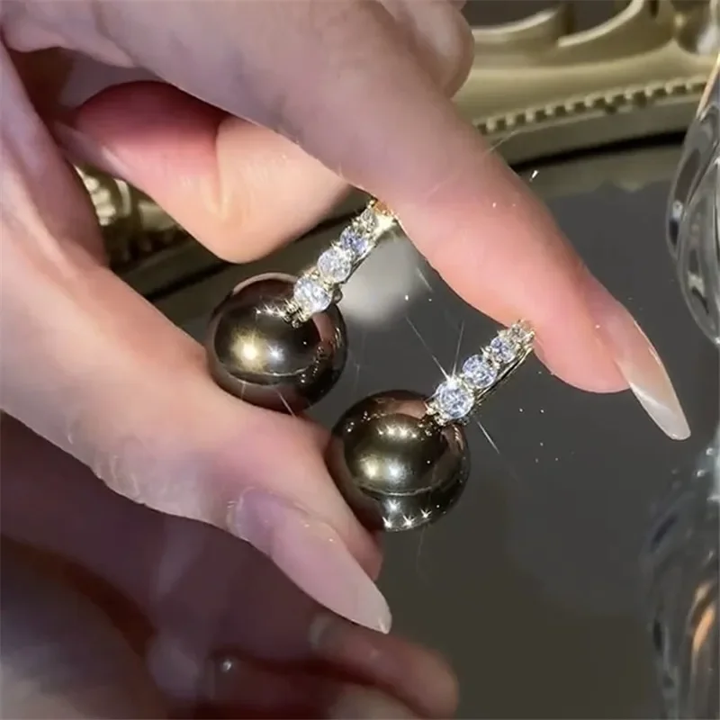 

2024 новые модные трендовые уникальные дизайнерские Элегантные и изысканные циркониевые жемчужные серьги для женщин ювелирные изделия Свадебная фотосессия премиум подарок