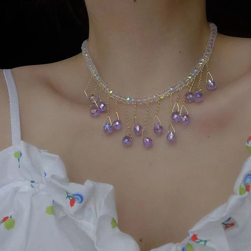 

Роскошное ожерелье-цепочка с кристаллами и кисточками