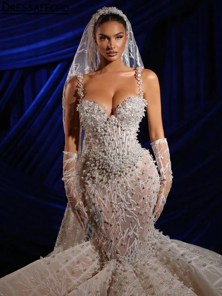 

Charming Illusion Pearls Beading Dubai Wedding Dresses Mermaid Spaghetti Straps Crystal Lace Saudi Arabic Bridal Gown