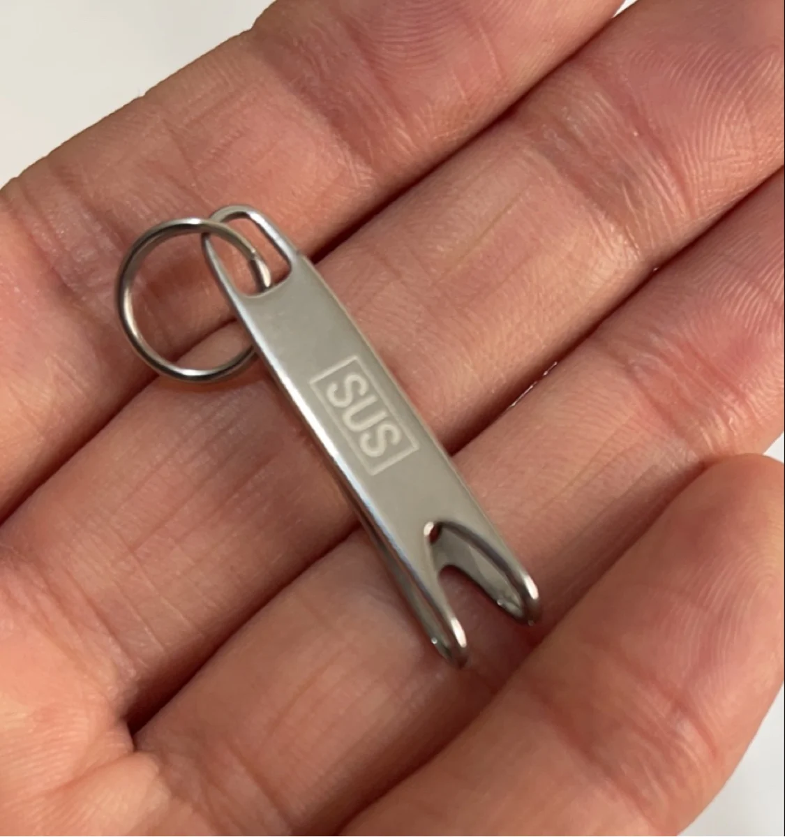 

Портативный многофункциональный зажим из титана