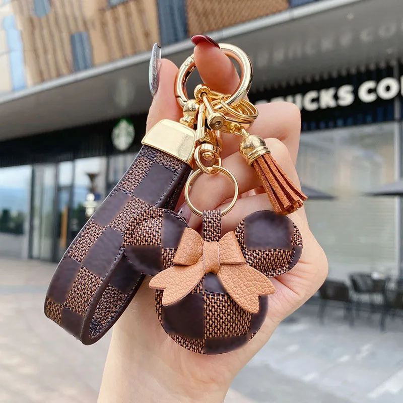 

Милый женский стиль, винтажный Клетчатый Кожаный ремешок на запястье, кольца для ключей с кисточкой, Модный кулон, брелки для автомобильных ...