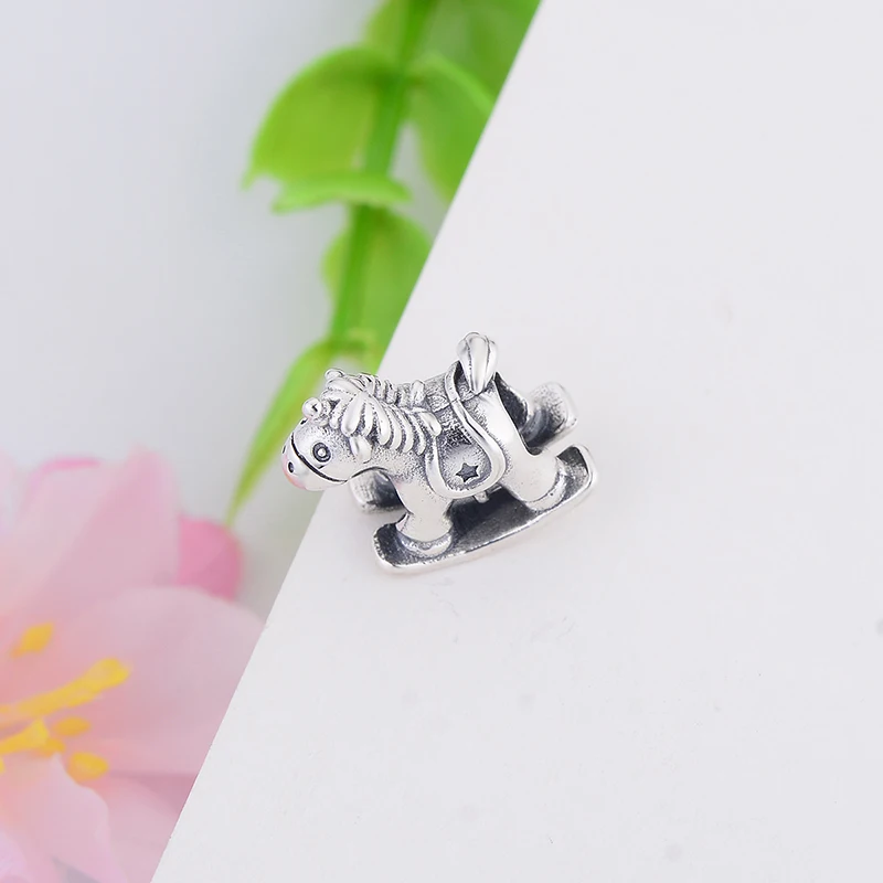 Браслет-качалка в виде лошади-качалки из серебра 100% пробы