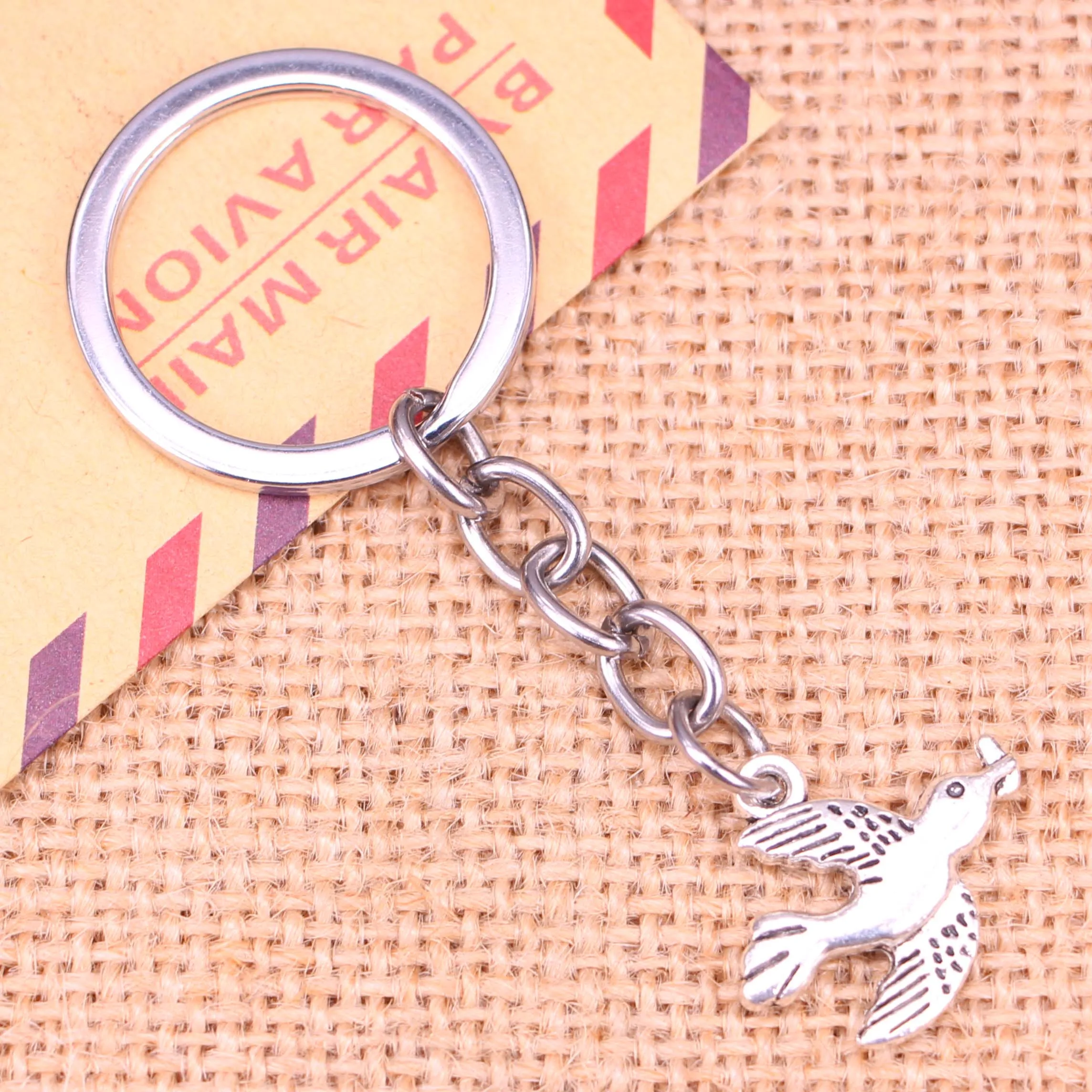 

20pcs New Fashion Keychain 21x19mm swallow Pendants DIY Men Jewelry Car Key Chain Ring Holder Souvenir For Gift
