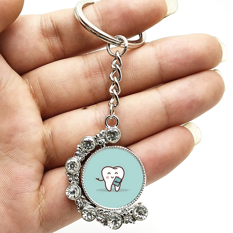 

New Personality Cute Protect Teeth Mood Double-sided Rotating Crystal Pendant Keychain Glass Convex Round Keychain Children Gift