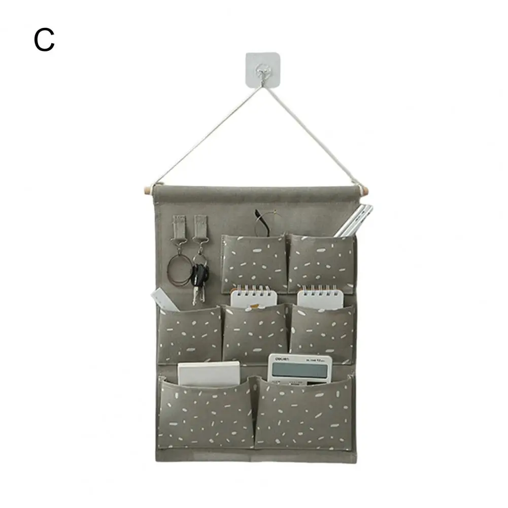 

Good Multiple Pockets Eye-catching Hanging Storage Bag Cosmetics Toy Key Container Storage Bag for Home Wall Hanging Bag