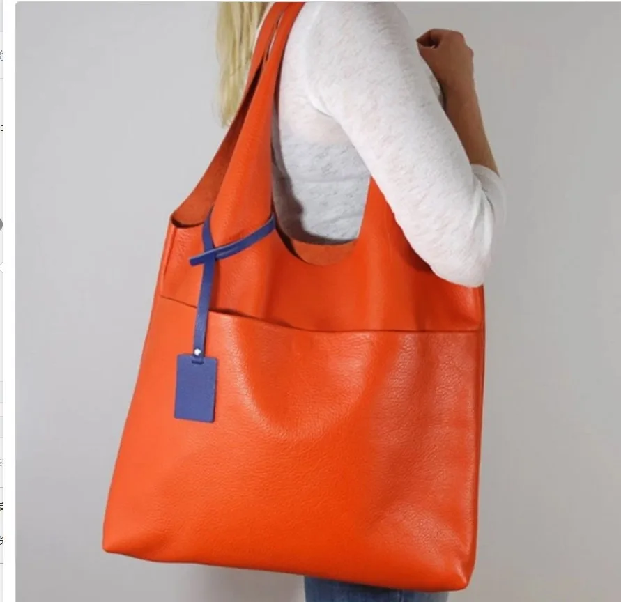 

Women's vest bag New European and American retro soft leather large capacity shoulder orange Tote school shopping holiday bag