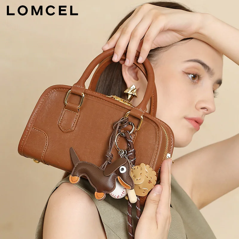 Фото Кожаная сумка LOMCEL 61 Boston - новая модель для женщин, подходит для ежедневных поездок на работу, универсальная сумка-боулинг, сумка через плечо, одинарная. №1