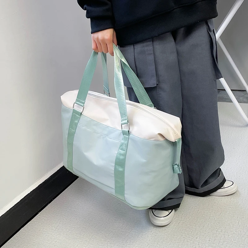 Korean Version Of Travel Bag Female Light Fitness Business Trip Portable Light Luxury Folding Luggage Storage Bag Handbag M615