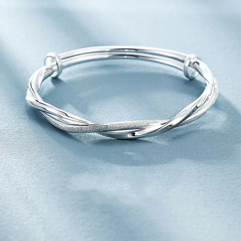 

High Quality Polished Inlaid Shiny Zircon Twisted Bracelet Women Luxurious Elegant Delicate Wrist Jewelry Jewelry Wholesale