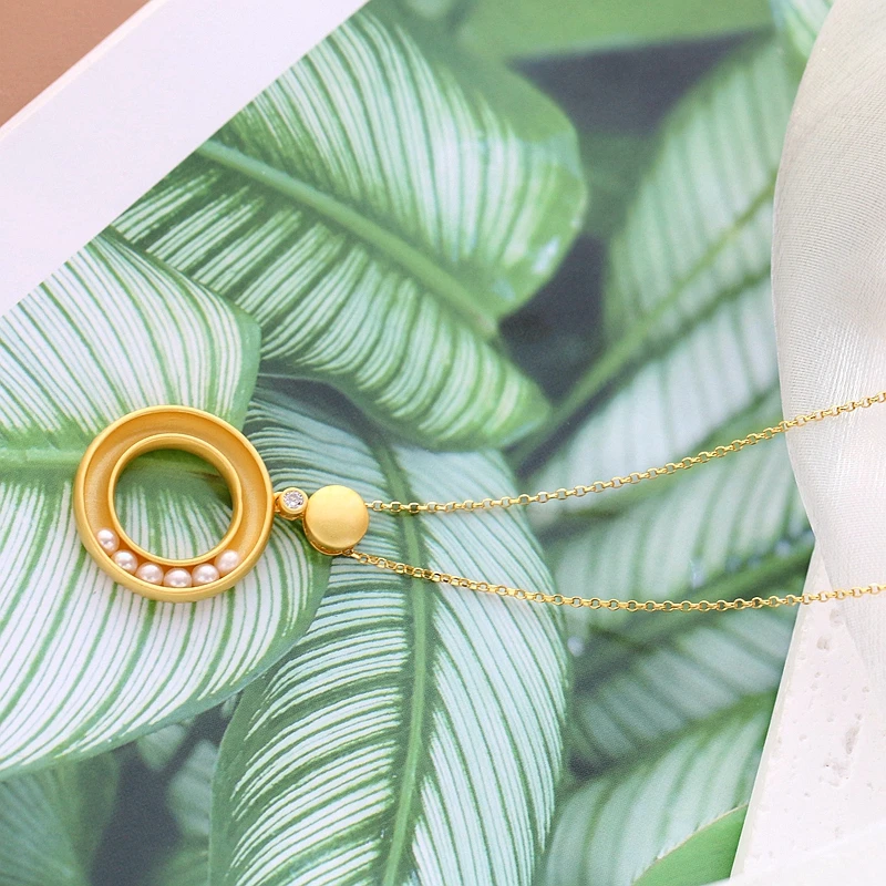 Кулон кольцевой из серебра 925 пробы с натуральным жемчугом