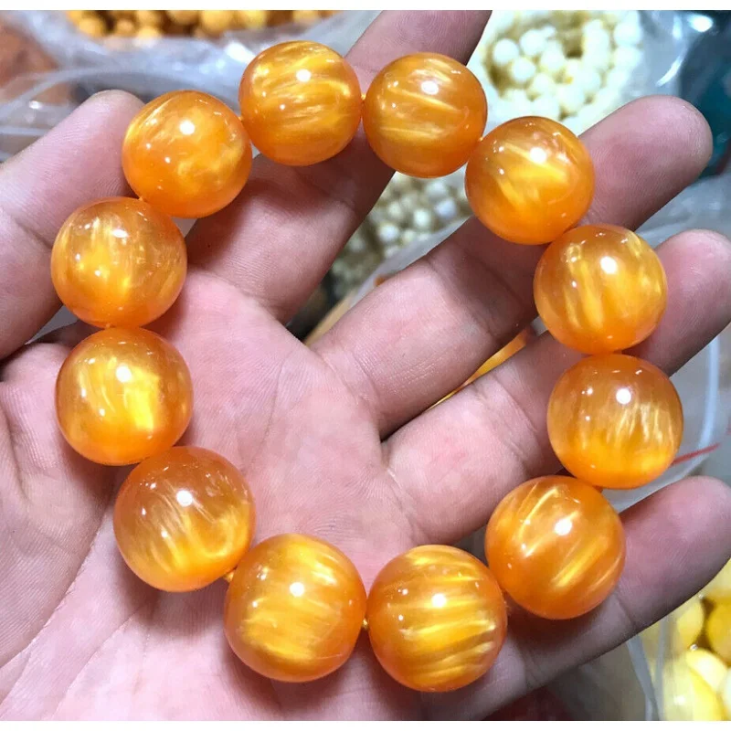 

Natural round bead amber flower beeswax cat'sEye Bracelet for men and women 20mm Certificate