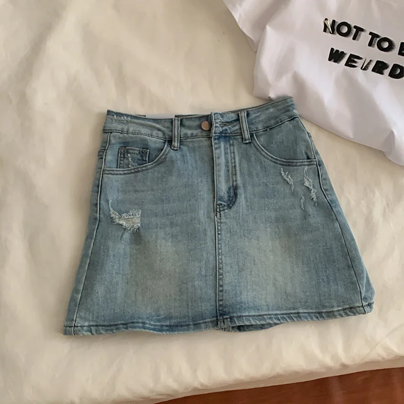 

Летняя женская джинсовая мини-юбка с высокой талией, корейские джинсы, корейские карманы, трапециевидные джинсовые юбки, Женская облегающая Элегантная Модная уличная одежда