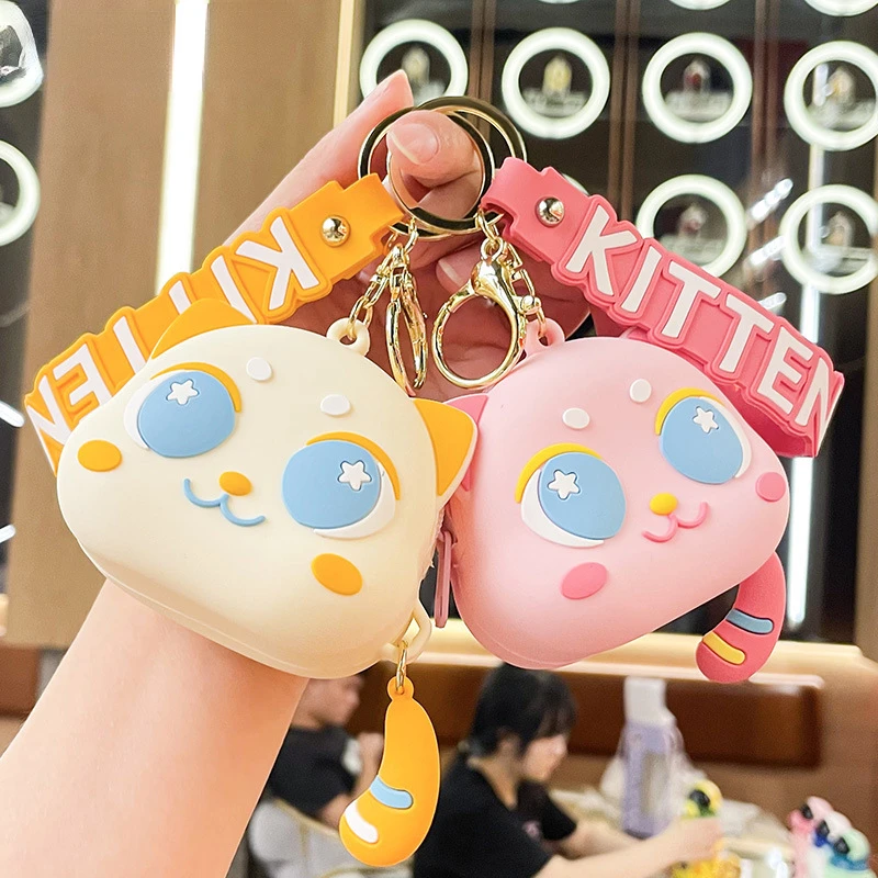 

Creative Big Eyed Cat Zero Wallet Jewelry Pendant Silicone Earphone Coin Storage Bag Key Chain