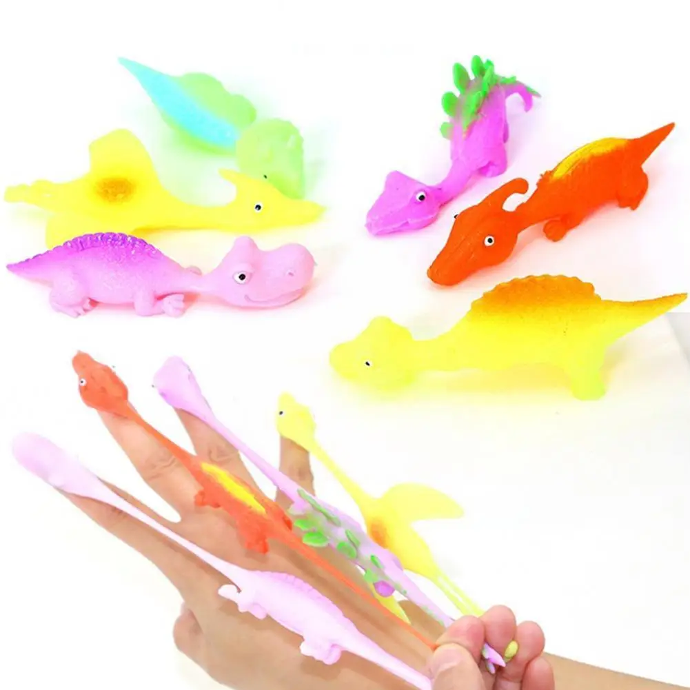 

1Pcs Fun TPR Finger Slingshot Catapult Stress Vent Novelty Finger Ejection Squishy Kawaii Dinosaur Finger Shooting Toys for V4R9