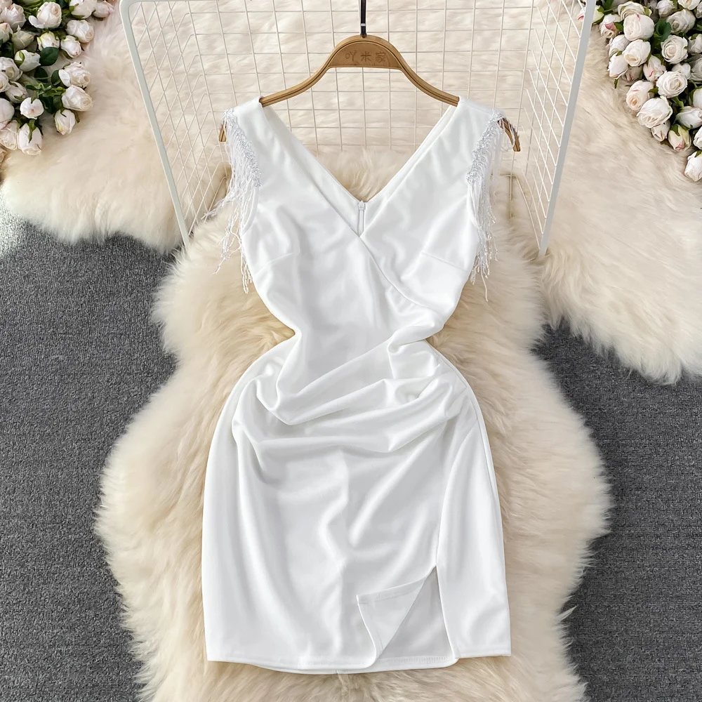 

Été nouvelle mode col en v gland sans manches serré Mini robe maigre fille courte fendue moulante Wrap Sexy robes fête boîte de nuit