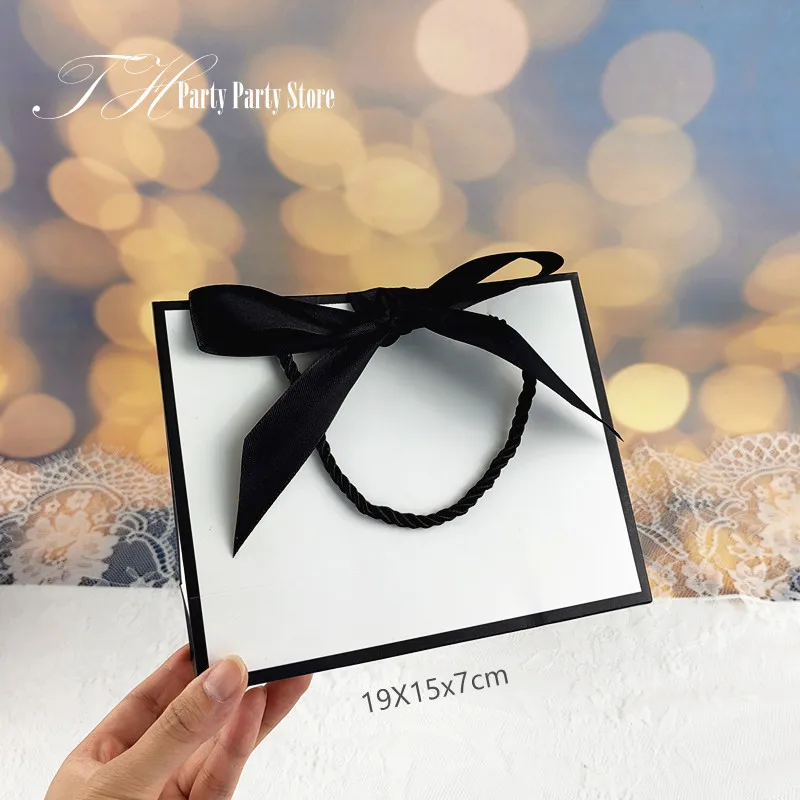 10Pcs/Lot New White Black Bow High Quality Simple Gift Bag Kraft Paper Candy Box With Handle Wedding Birthday Party - купить по