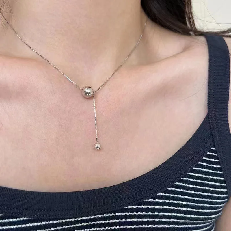 

Titanium Steel Necklace for Women Metal Ball Pendant Sweater Chain Female Simple Luxury Temperament Necklace Jewelry Party