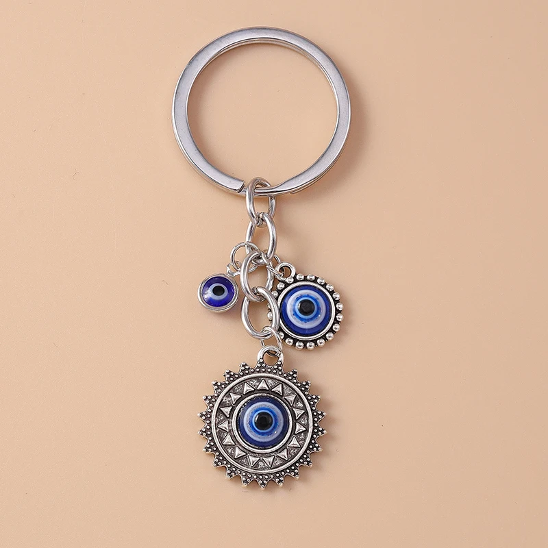 Металлический брелок Lucky Evil Eyes с бирюзовым камнем