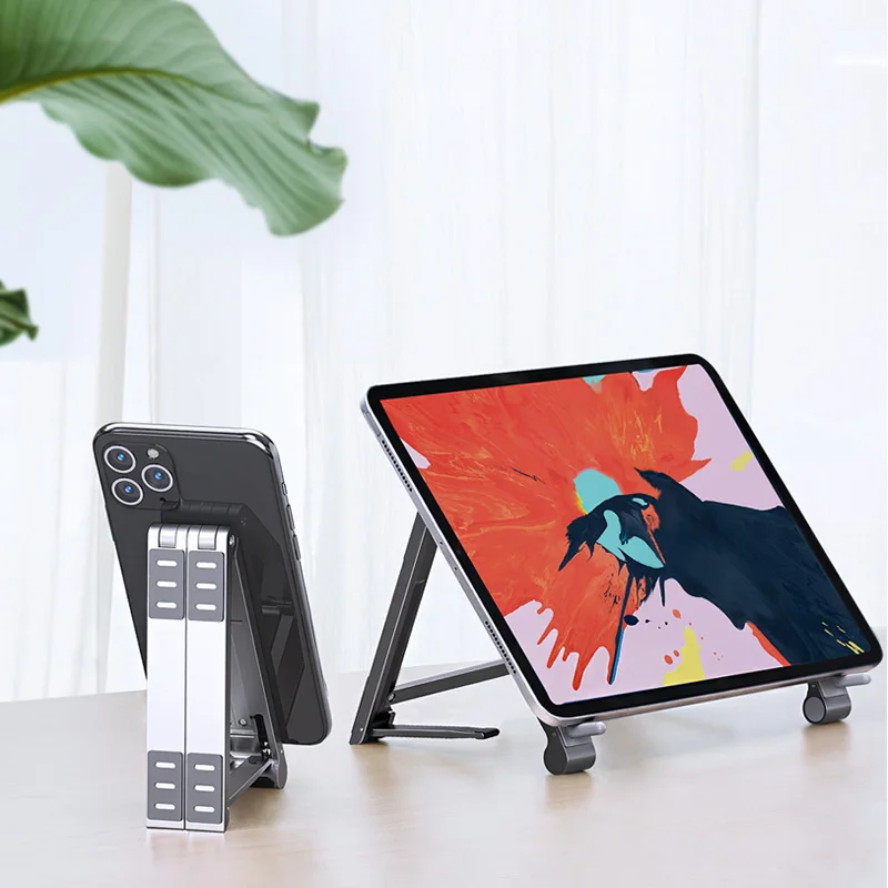 

KYLETROC Multi-functional magic bracket Adjustable & Foldable Desktop StandCompatible with notebook/tablet/mobile phone Stand