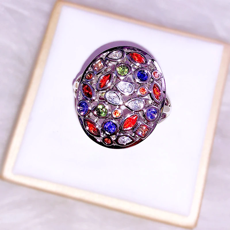 Женское кольцо в стиле бохо с радужным овальным камнем из серебра 925 пробы