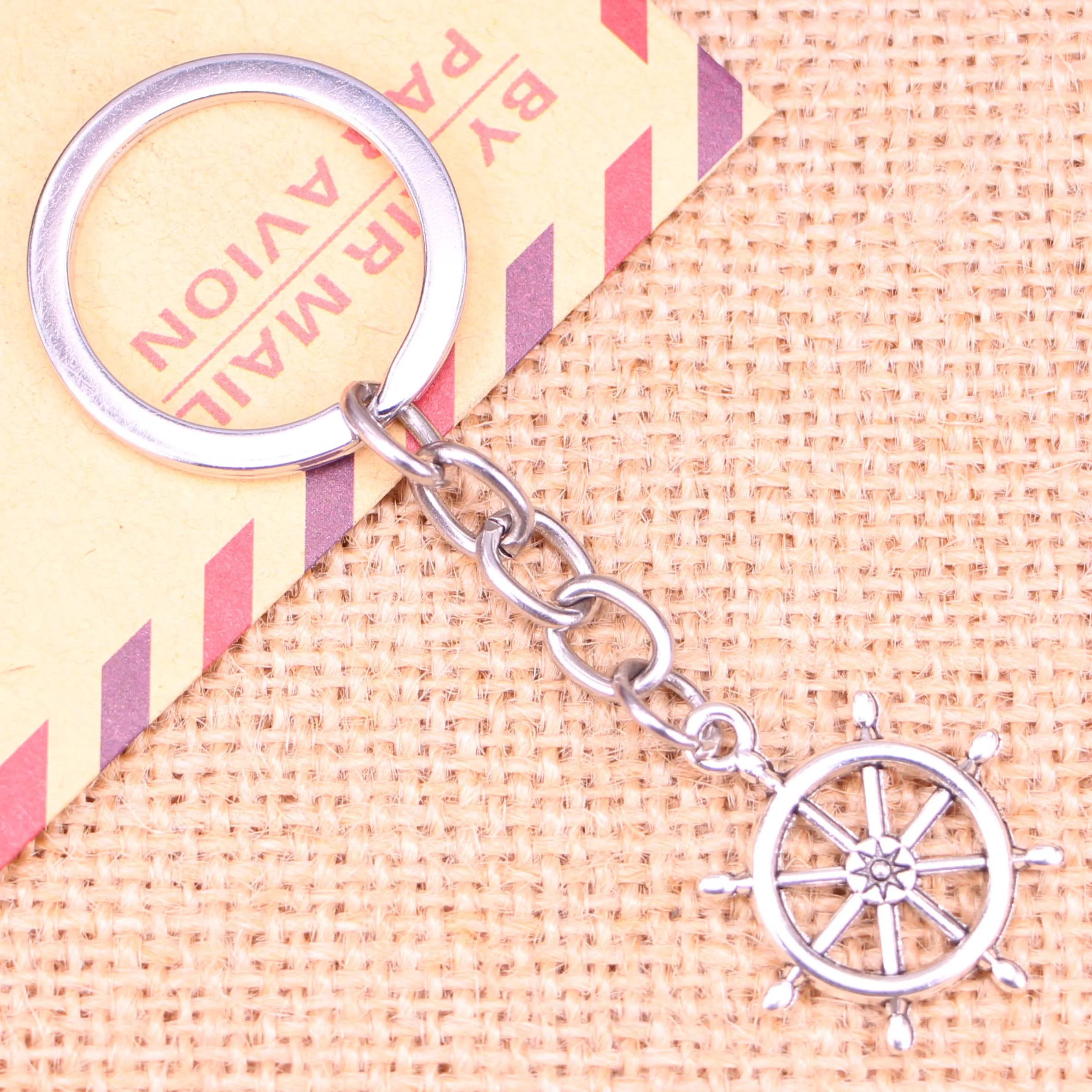 

20pcs New Fashion Keychain 27x23mm rudder helm Pendants DIY Men Jewelry Car Key Chain Ring Holder Souvenir For Gift
