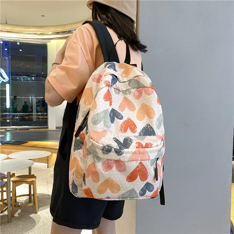 

Student schoolbag travel backpack simple and fashionable 2022 new junior high school students large-capacity graffiti backpack