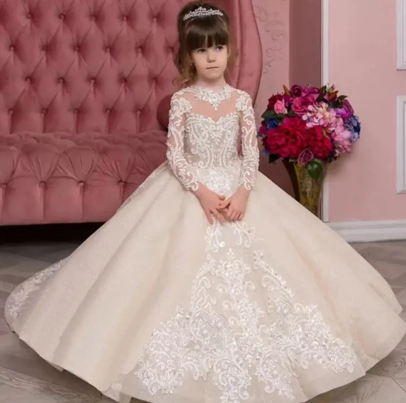 

2023 Princess Champagne Flower Girl Dresses Long Sleeve Sheer Crew Neck Appliques Ruched Tulle Girl Party Pageant Gown