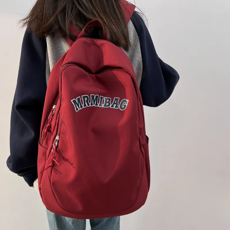 

Latest Korean Ins Retro Letters Solid Color Large Capacity Backpack Ulzzang Japanese High School Student Schoolbag for Female