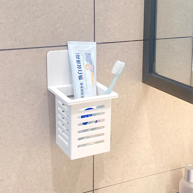 

Toothpaste Toothbrush Holder Wall Mounted Bathroom Storage Rack Self-adhesive Storage Basket Floating Shelves Hollow Drain Rack