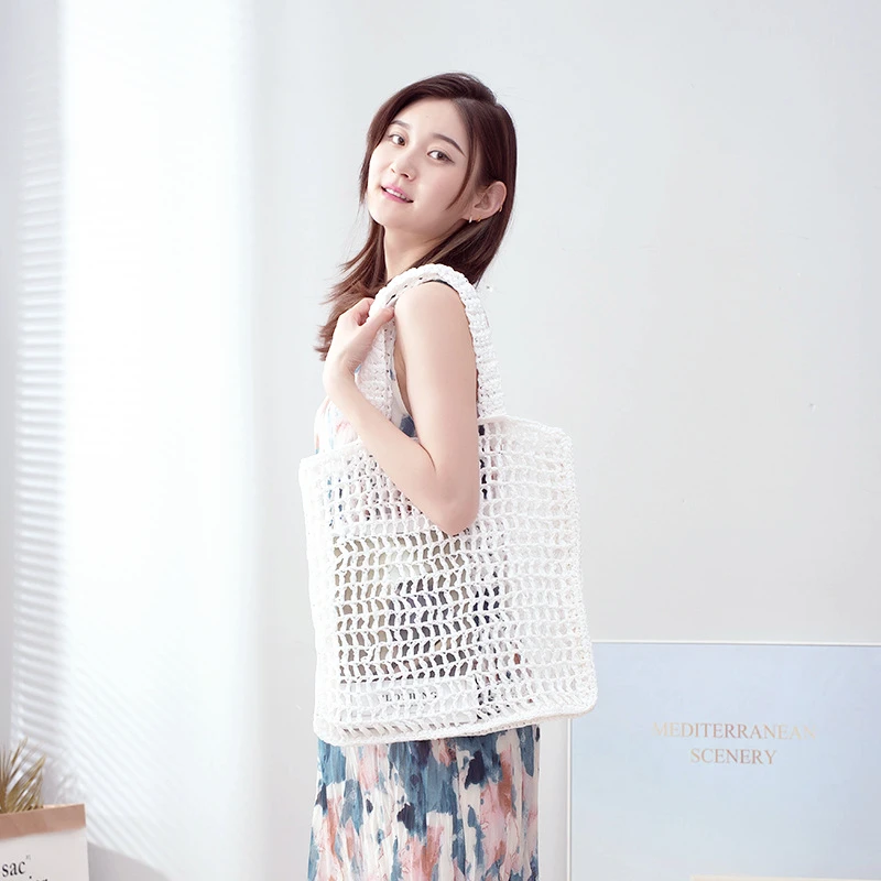 

New Straw Woven Bag In Summer 2022 Large Capacity Hollow Woven Hand-held One Shoulder Beach Bag Fashionable and Popular Elements
