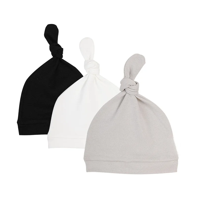 

Шапка для новорожденных мальчиков и девочек, мягкая Регулируемая шапка из 100% хлопка, шапка с узлом, однотонная детская шапочка для фото