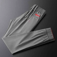 light luxury simple ice silk casual sports pants mens summer ultra thin impervious mens elastic anti wrinkle trousers
