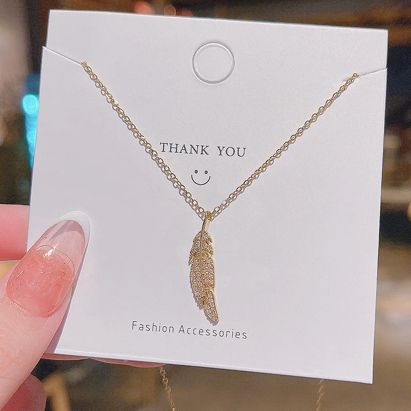 

2021 New Feather Design Sense Finely Inlaid Pendant Titanium Steel Necklace Female Ins Graceful Online Influencer Choker Chain
