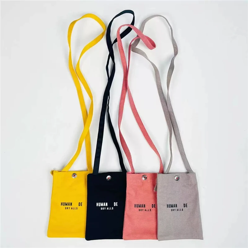 

Human Made Bag Snap Opening Double Graphic HUMAN MADE Logo Backpacks Men Women 1:1 Canvas Adjustable Rope Bag