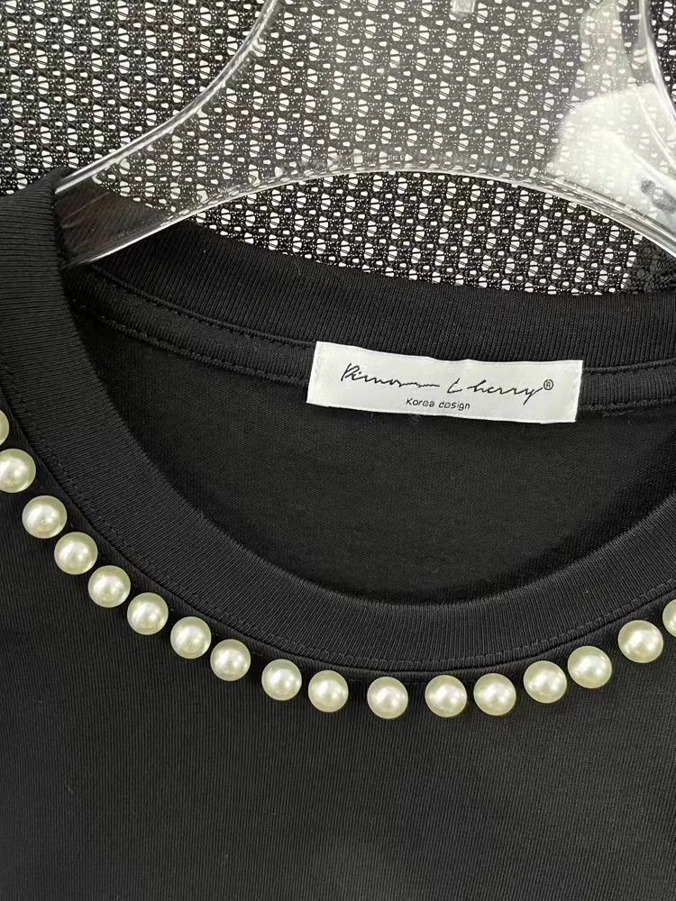 Женская свободная футболка с бусинами