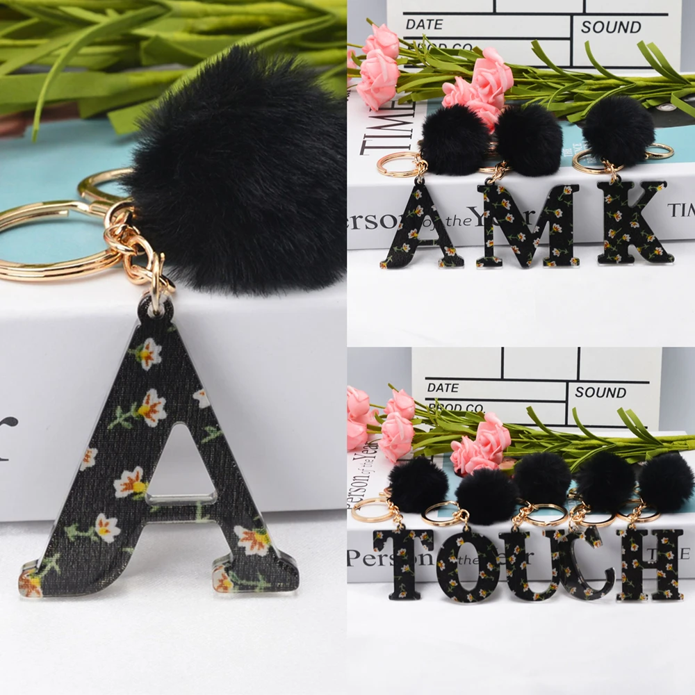 

New 26 Letter Pendant Petal Pattern With Black Fur Ball Keychains Trendy Key Holder Bag Ornaments Teens Unisex Accessories