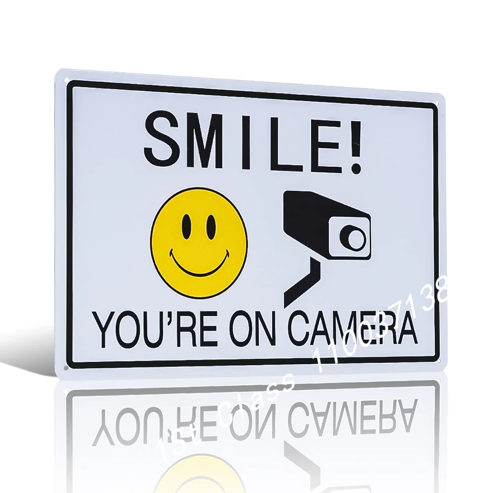 

Smile You're On Camera Sign, Video Surveillance Sign, Warning for CCTV Monitoring System