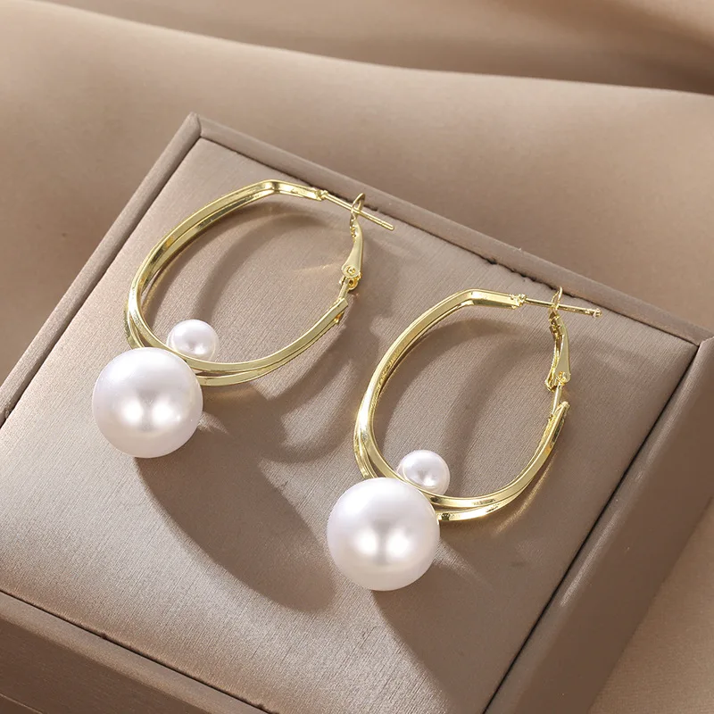

Sterling Silver Needle Korean Geometric Pearl Earrings Fashion Special Interest Light Luxury Design Temperament and Exaggerated