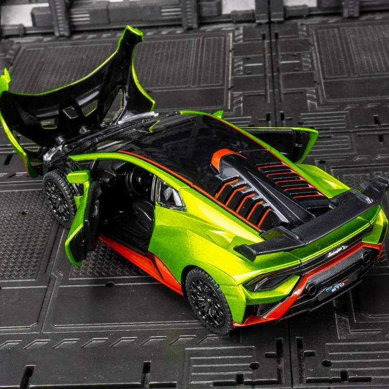 Фото Модель автомобиля Lamborghini STO от Rastar в масштабе 1:32, из сплава, с открывающимися дверями и капотом, с имитацией звука и света. №2