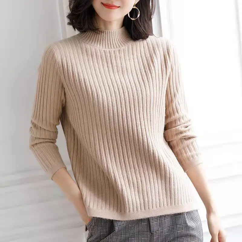 

Свитер Женский вязаный свободного покроя с высоким воротником