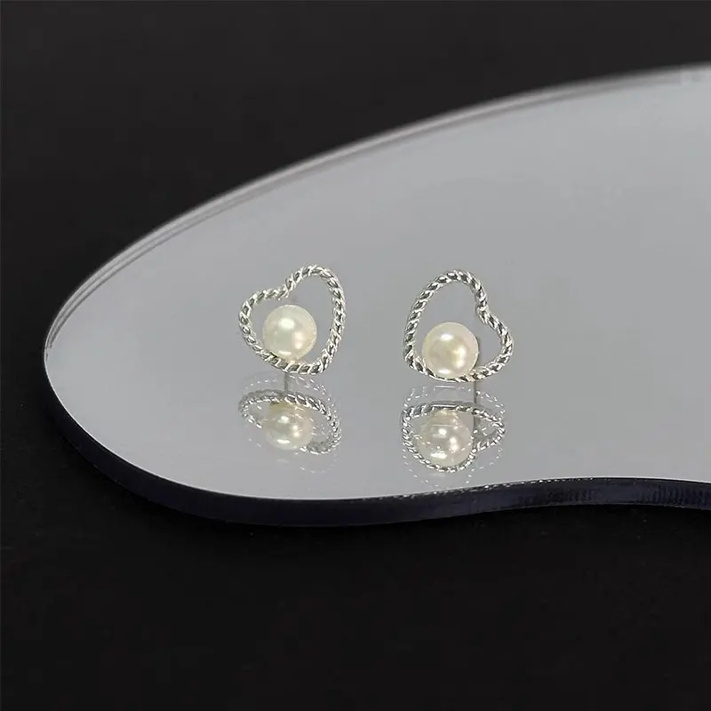 

Cocosily S925 Sterling Silver Heart Shaped Fried Dough Twists Woven Pearl Earrings For Women Exquisite And Charming Jewelry Gift