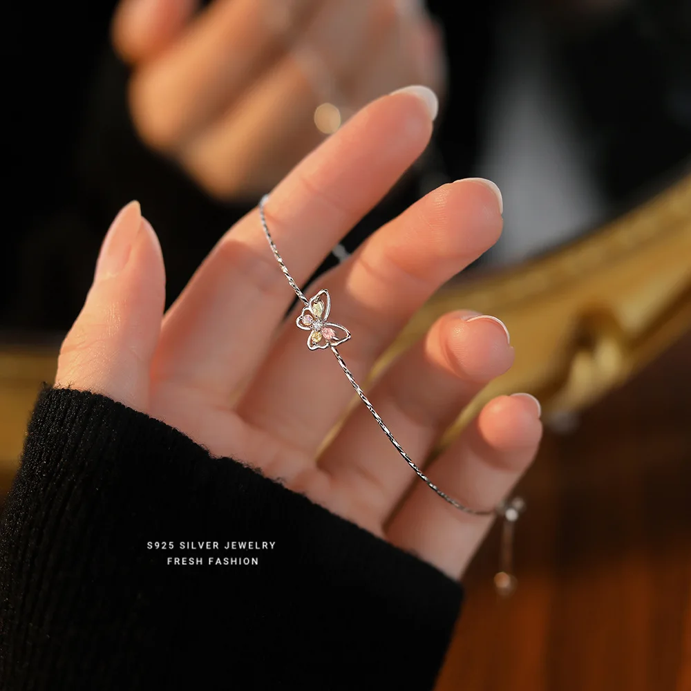 Женский браслет из серебра 925 пробы с разноцветными бабочками циркония