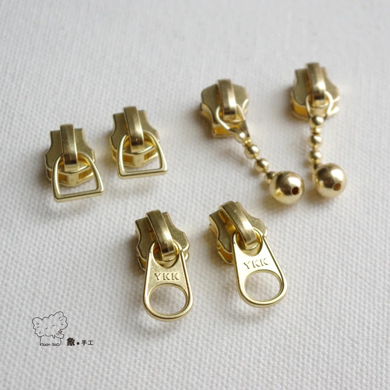 

Рекомендуемая самодельная ручная застежка-молния YKK5 с золотым и медным кодом