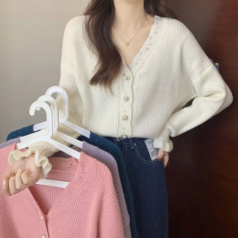

2023 French Style Gentle Ruffle V-neck Long Sleeve Knitted Cardigan Women's Loose Long Sleeve Pearl Buckle Sweater Coat Female