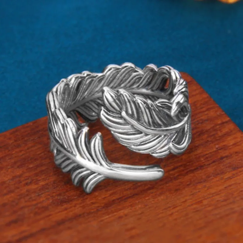 Мужское и женское кольцо из серебра 925 пробы с перьями