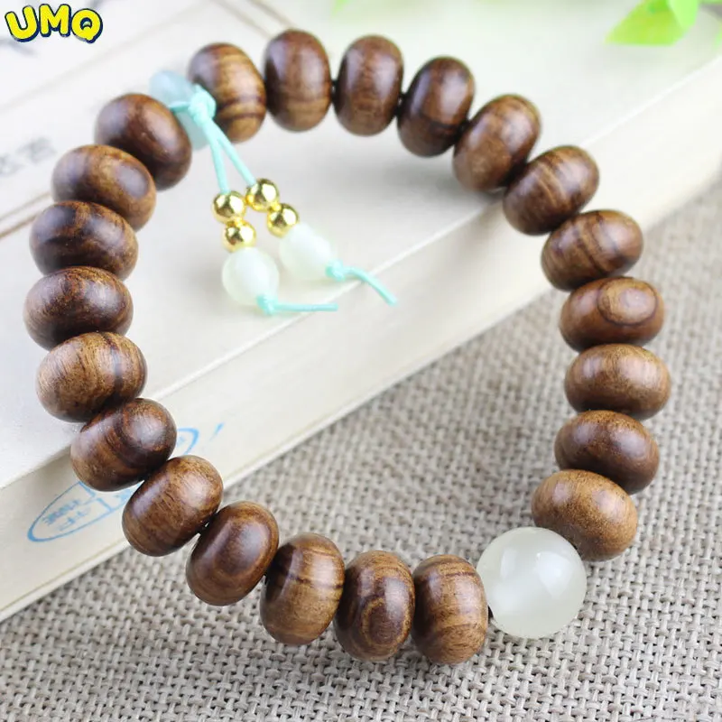 

Natural Solid Wood Creative Black Flower Pear Hand String Abacus Beads 8 * 12mm Sandalwood Live Broadcast Fan Welfare Amulet