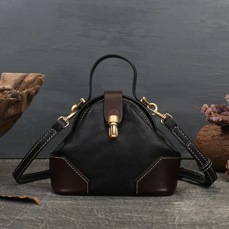Genuine leather women's bag 2023 new style lock button dumplings bag advanced sense single shoulder messenger bag retro handbag